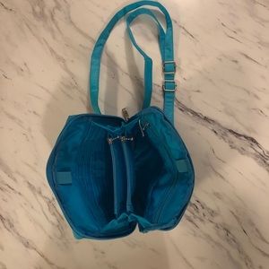 Crossbody purse.  Beautiful color!